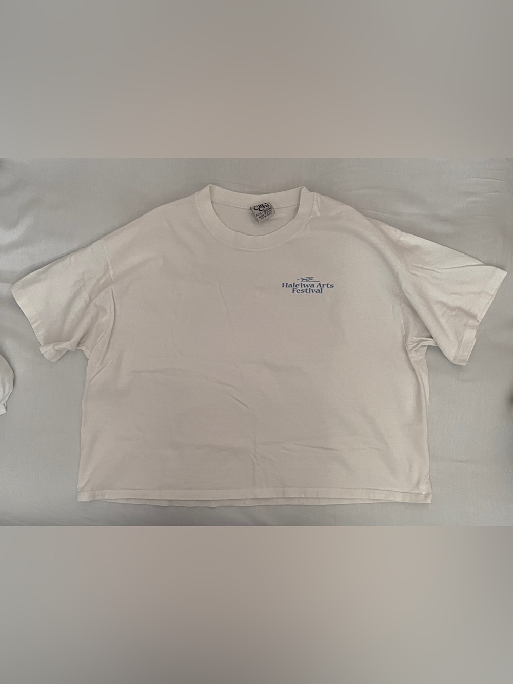 100% cotton Hale'iwa Arts Festival Cropped Tee